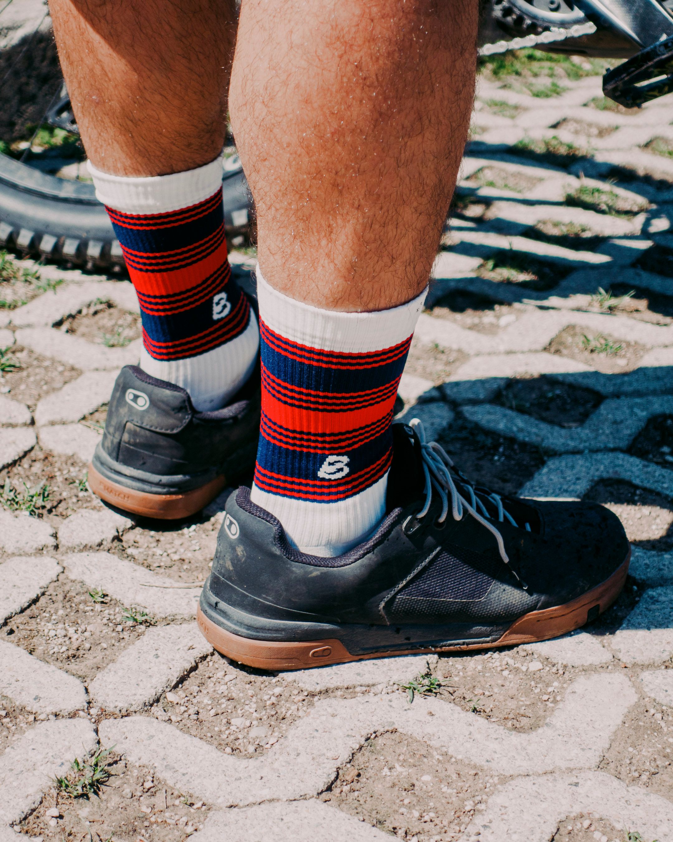 Cyclist wearing Bikeflip x Oxeego technical socks